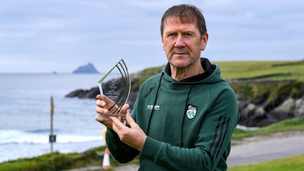 22 October 2025; Kerry senior football manager Jack O'Connor with his GWA Gaelic Football Personality of the Year award in front of the Skelligs rocks at St Finan's Bay in Ballinskelligs, Kerry, ahead of the Gaelic Writers Association Awards, proudly supported by Dalata Hotel Group. Photo by Brendan