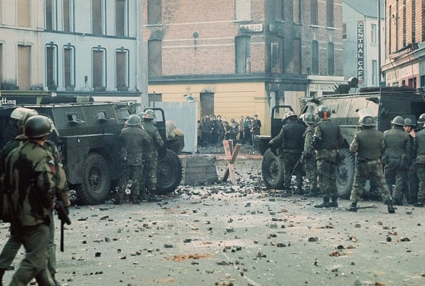 Youths confront British soldiers minutes before paratroopers opened fire killing 14 civilians on what became known as Bloody Sunday. The standoff is near barricade 14 on William Street, Derry/Londonderry, Northern Ireland on 30th January 1972 (Photo by William L. Rukeyser/Getty Images)