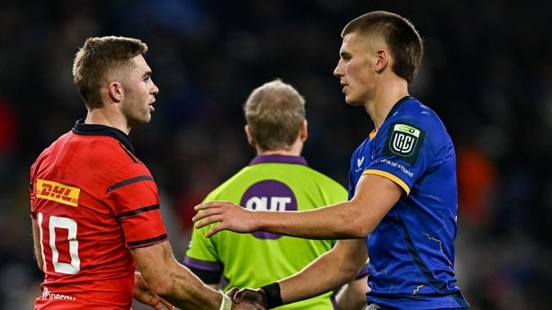 18 October 2025; Jack Crowley of Munster and Sam Prendergast of Leinster after the United Rugby Championship match between Leinster and Munster at Croke Park in Dublin. Photo by Seb Daly/Sportsfile