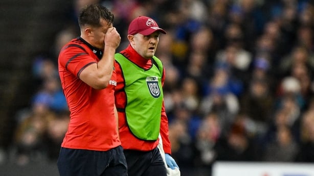 18 October 2025; Brian Gleeson of Munster leaves the pitch with an injury during the United Rugby Championship match between Leinster and Munster at Croke Park in Dublin. Photo by Brendan Moran/Sportsfile