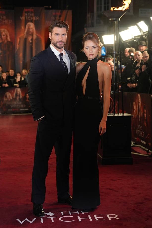 Two actors pose on red carpet of Witcher premiere