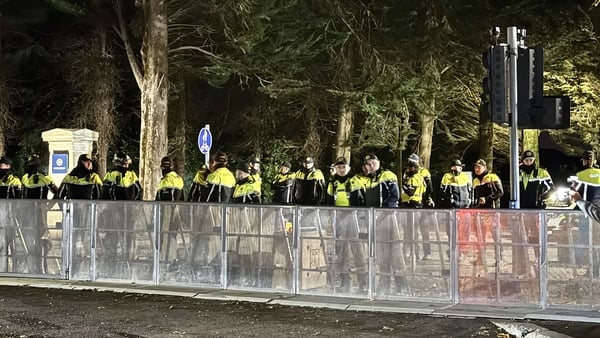 Gardai are scene in a line at Citywest
