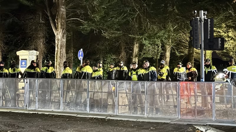 Gardaí at Citywest earlier this evening as dozens of demonstrators gathered