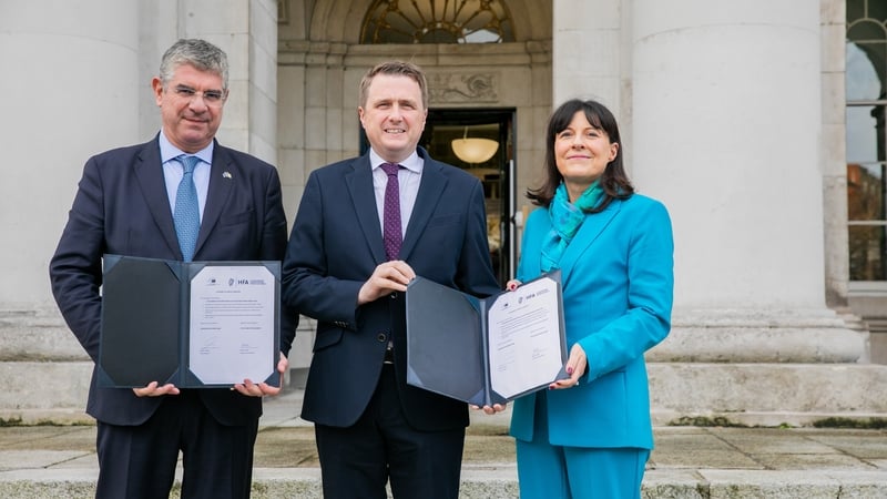 European Investment Bank Vice President Ioannis Tsakiris, Minister James Browne and Deirdre Collier, Housing Finance Agency CEO