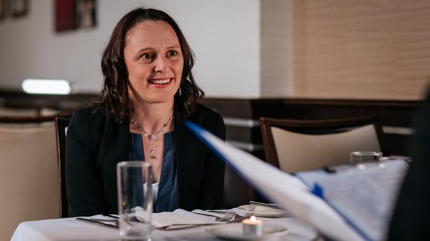 Mary Murray in a restaurant scene in Abode