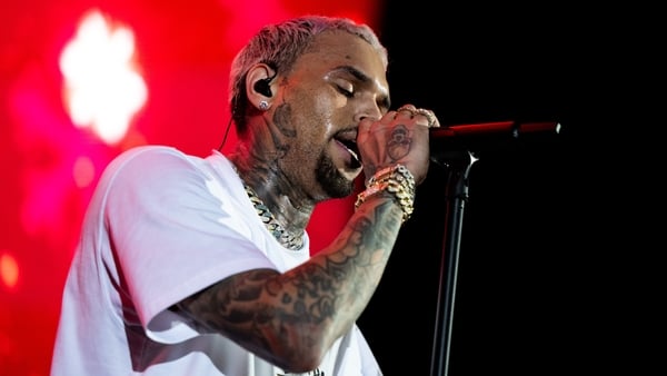 Singer Chris Brown performs onstage during the first annual In My Feelz Festival at Banc of California Stadium on 17 December, 2022 in Los Angeles, California Singer Chris Brown performs onstage during the first annual In My Feelz Festival at Banc of California Stadium on 17 December, 2022 in Los Angeles, California