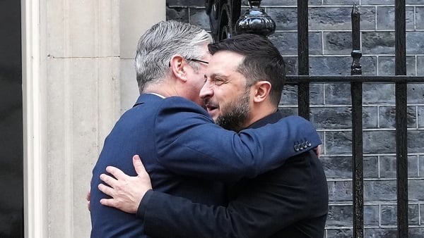 UK Prime Minister Keir Starmer hugs Volodymyr Zelenskyy President of Ukraine outside 10 Downing Street