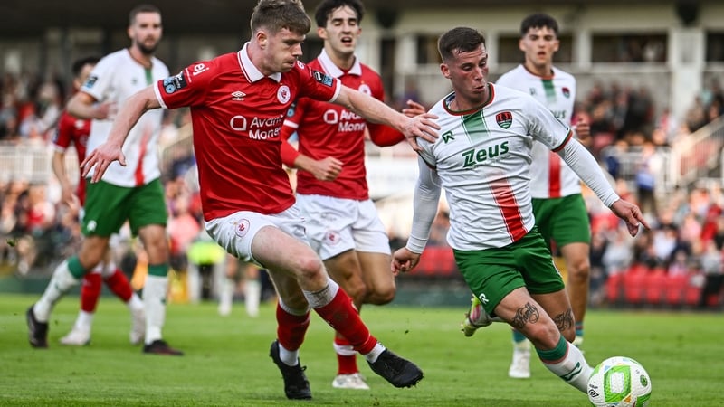 Evan McLaughlin of Cork City in action against Conor Reynolds during the clash between the sides in July