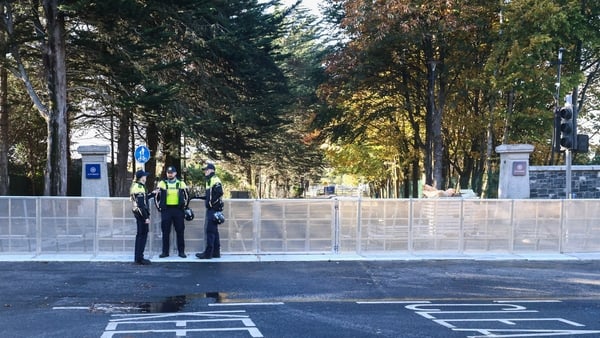 Gardai and workers erecting barriers blocking access to the IPAS building in the former Citywest Hotel