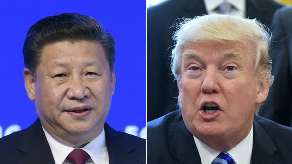 (COMBO) This combination of pictures created on March 30, 2017 shows China's President Xi Jinping (L) delivering a speech on the opening day of the World Economic Forum, on January 17, 2017 in Davos, and US President Donald Trump (R) announcing the final (COMBO) This combination of pictures created on March 30, 2017 shows China's President Xi Jinping (L) delivering a speech on the opening day of the World Economic Forum, on January 17, 2017 in Davos, and US President Donald Trump (R) announcing the final