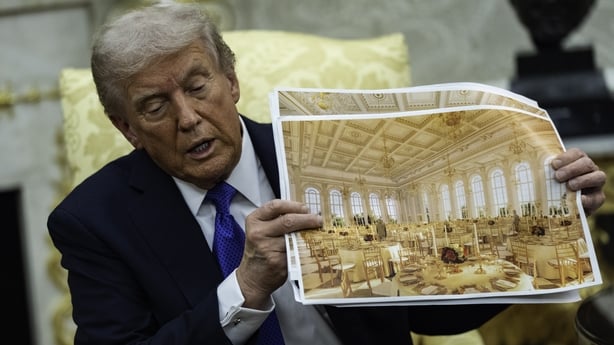 WASHINGTON, DC - OCTOBER 22, 2025: U.S. President Donald Trump speaks holding a photos of the new ballroom during a meeting with NATO Secretary General Mark Rutte in the Oval Office of the White House in Washington, DC on October 22, 2025. (Photo by Salwan Georges/The Washington Post via Getty Image