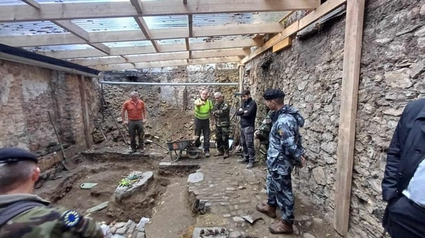 General Clancy center with Mayor of Huy Christophe Colignon to his right myself to his left the two soldiers from the 12th Infantry Battalion kneeling at the front Sergeant Dave O Brien and Priva