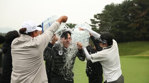 Junghwan Lee was soaked in water in the celebrations afterwards