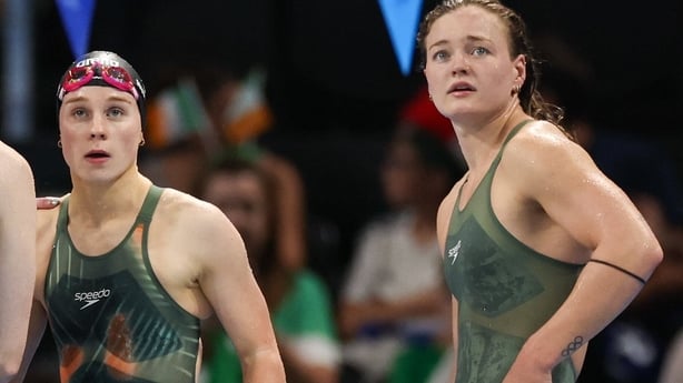 3 August 2024; Team Ireland swimmers, from left, Danielle Hill, Ellen Walshe and Mona McSharry during the women's women's 4 x 100m medley relay at the Paris La Défense Arena during the 2024 Paris Summer Olympic Games in Paris, France. Photo by Ian MacNicol/Sportsfile