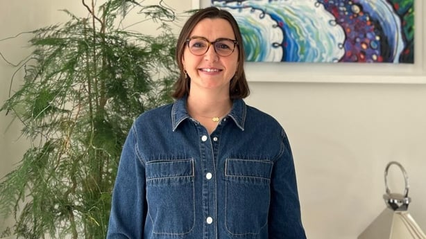 Una Ryan is pictured in an office