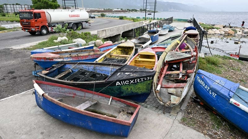 Fishermen boats are tied together in preparation for the arrival of Hurricane Melissa in East Kingston