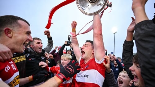 Daingean Uí Chúis captain Paul Geaney celebrates with the Bishop Moynihan Cup after the Kerry SFC final