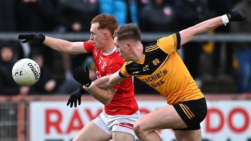 Loughmacrory matchwinner Gareth Donaghy (R) competes with Seanie O'Donnell of Trillick