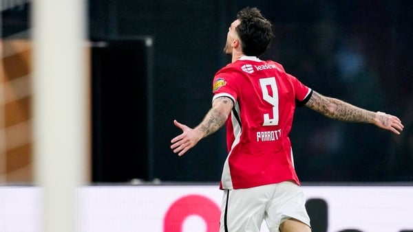ALKMAAR, NETHERLANDS - OCTOBER 26: Troy Parrott of AZ Alkmaar celebrates after scoring his teams first goal during the Dutch Eredivisie match between AZ Alkmaar and FC Utrecht at AFAS Stadion on October 26, 2025 in Alkmaar, Netherlands. (Photo by Ed van d