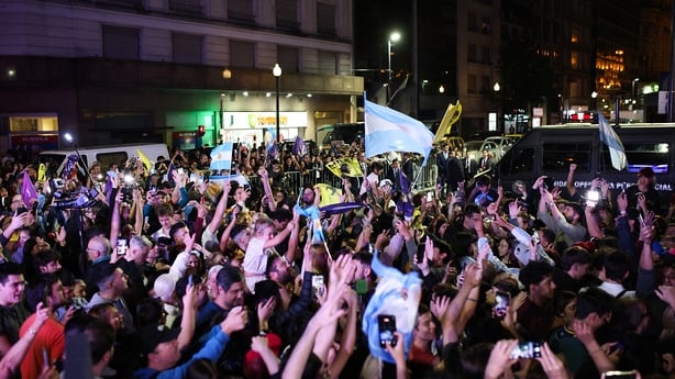 BUENOS AIRES, ARGENTINA - OCTOBER 26: Supporters of La Libertad Avanza celebrate the results outside the bunker of La Libertad Avanza following the mid-term elections on October 26, 2025 in Buenos Aires, Argentina. La Libertad Avanza, President Javier Milei's party, has received 40.84% of the votes
