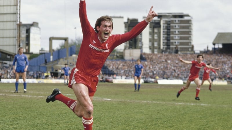 Kenny Dalglish raises his arms in celebration after scoring the winning goal that gives Liverpool the English League Division One Championship title for the 1985/86 season after beating Chelsea Football Club 1-0 on 3 May 1986 at Stamford Bridge in London