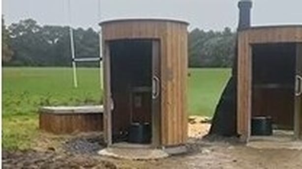 Images of two burned eco-toilets