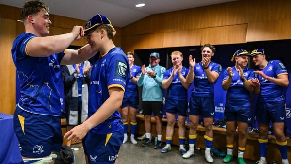 25 October 2025; Ciarán Mangan of Leinster is presented with his first cap by teammate and brother Diarmuid Mangan, left, after the United Rugby Championship match between Leinster and Zebre Parma at the Aviva Stadium in Dublin. Photo by Brendan Moran/Spo