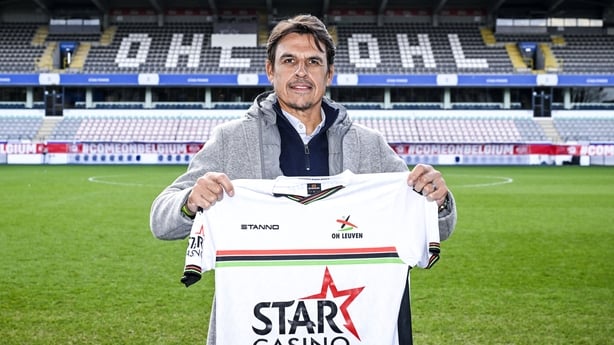 Newly-named OH Leuven's Welsh Chris Coleman poses with a jersey during a press conference of Belgian soccer team Oud-Heverlee Leuven in Leuven on December 2, 2024. (Photo by Tom Goyvaerts / Belga / AFP) / Belgium OUT