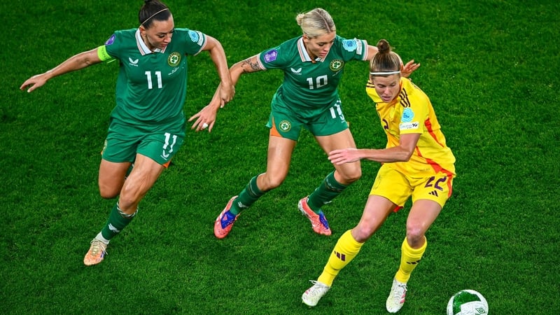 Katie McCabe and Denise O'Sullivan challenge Belgium's Laura Deloose during the first leg win