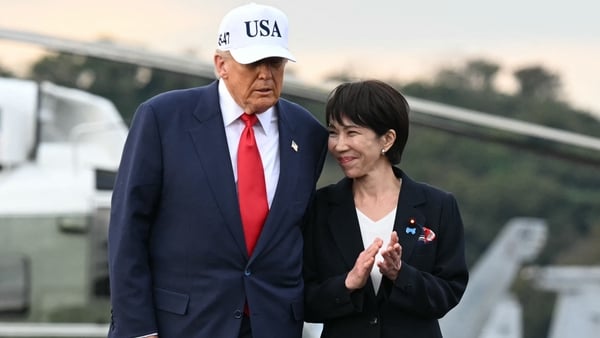 US President Donald Trump and Japan's Prime Minister Sanae Takaichi on board the USS George Washington aircraft carrier