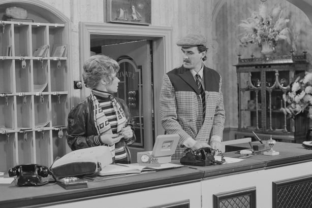 Actors Prunella Scales and John Cleese in a scene from episode 'The Builders' of the BBC television sitcom 'Fawlty Towers', August 3rd 1975. (Photo by Don Smith/Radio Times via Getty Images)