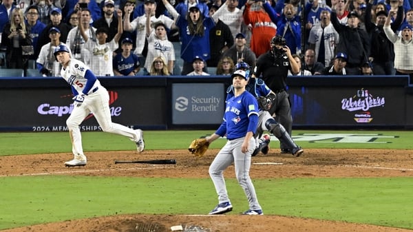Los Angeles, - October 27: Freddie Freeman #5 of the Los Angeles Dodgers hits a walk off solo home run to defeat the Toronto Blue Jays 6-5 and win game 3 of a World Series baseball game at Dodger Stadium in Los Angeles on Monday, October 27, 2025. (Photo