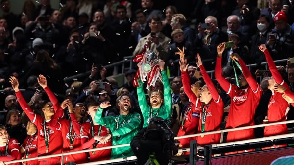LONDON, ENGLAND - FEBRUARY 25: Caoimhin Kelleher of Liverpool lifts the Carabao Cup trophy during the Carabao Cup Final match between Chelsea and Liverpool at Wembley Stadium on February 25, 2024 in London, England. (Photo by Robbie Jay Barratt - AMA/Gett
