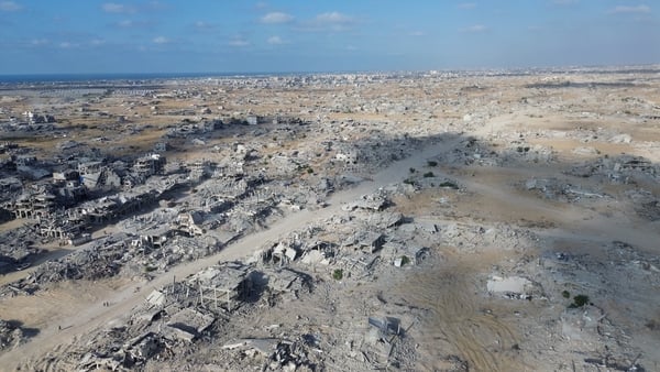 Palestinians try to clear the remains of buildings destroyed by Israeli attacks with limited resources i Khan Yunis, Gaza on October 28, 2025. (Photo by Mohammed Eslayeh/Anadolu via Getty Images)