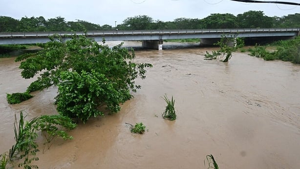 The Rio Cobre comes out of its banks near St Catherine, Jamaica