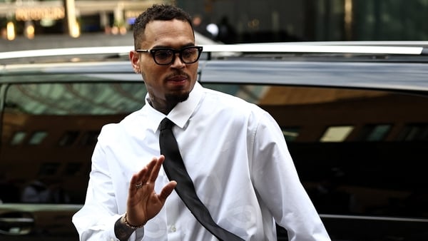 US rapper Chris Brown waves to fans upon arrival to attend a bail hearing at Southwark Crown Court in London on October 28, 2025 US rapper Chris Brown waves to fans upon arrival to attend a bail hearing at Southwark Crown Court in London on October 28, 2025