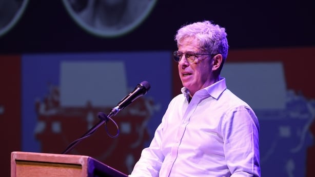 actor Andrew Bennett reading on stage at 2025 RTÉ Short Story Competition awards night, Pavilion Theatre Dun Laoghaire