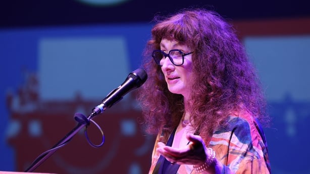 actor Caitríona Ní Mhurchú reading on stage at 2025 RTÉ Short Story Competition awards night, Pavilion Theatre Dun Laoghaire