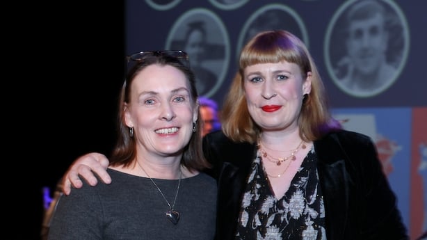 judge Jan Carson presents Angela Finn with 2nd prize in the 2025 RTÉ Short Story Competition, on stage at awards night in Pavilion Theatre Dun Laoghaire