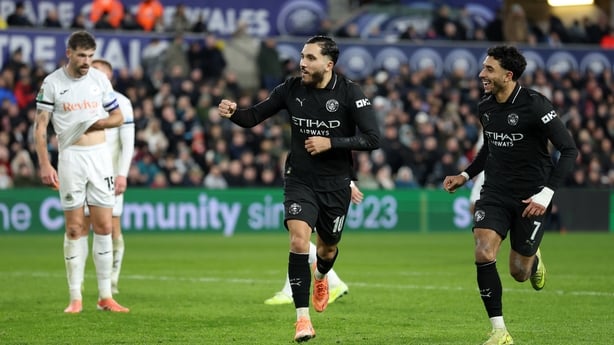 SWANSEA, WALES - OCTOBER 29: Rayan Cherki of Manchester City (L) celebrates scoring his team's third goal with teammate Omar Marmoush (R) during the Carabao Cup Fourth Round match between Swansea City and Manchester City at Swansea.com Stadium on October 29, 2025 in Swansea, Wales. (Photo by Dan Mul