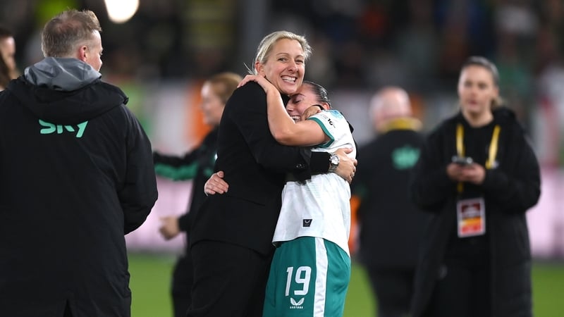 Republic of Ireland head coach Carla Ward and Abbie Larkin celebrate success in Leuven