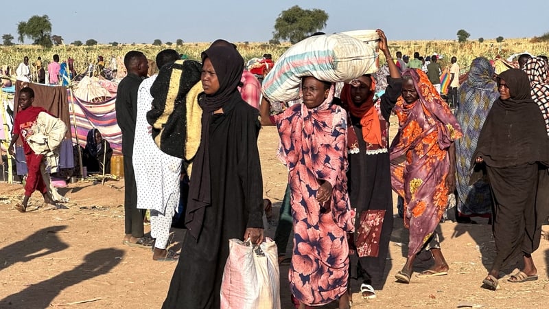 Displaced people who fled El-Fasher after the city fell to the Rapid Support Forces arrive in the town of Tawila war-torn Sudan's western Darfur region