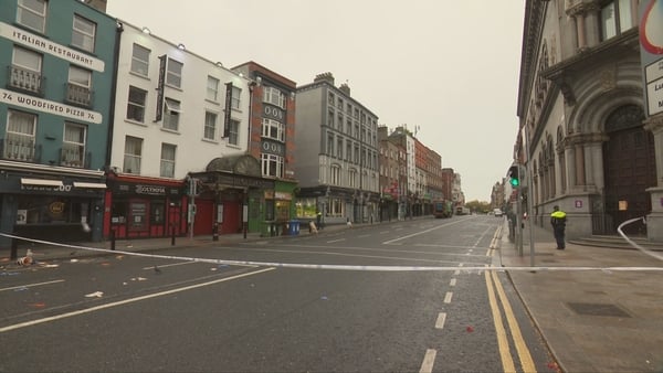 A picture of Dame Street with garda tap going across