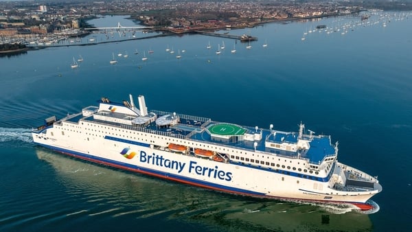 A Brittany Ferries ship sails out from a harbour