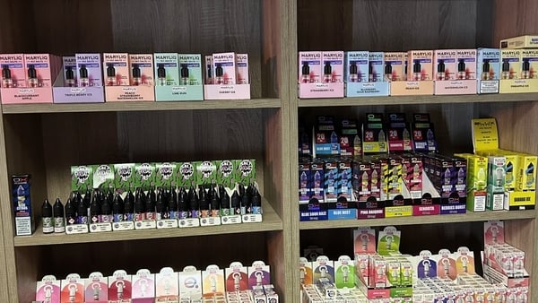 A shelf filled with vaping products A shelf filled with vaping products