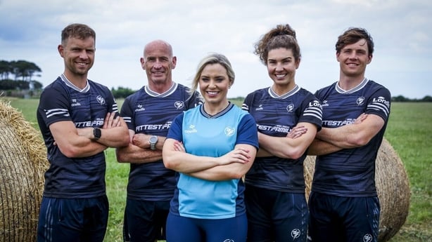 Carr family posing with Anna Geary
