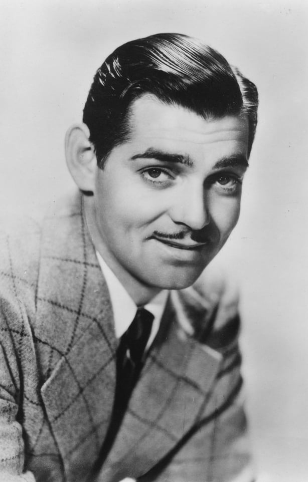 A black and white photo of Clark Gable