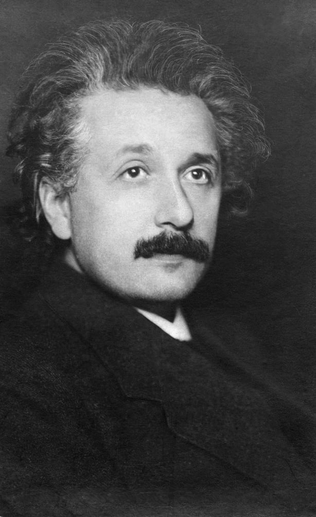 A black and white photo of Albert Einstein