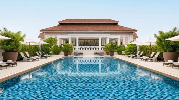 The outdoor pool at Raffles Singapore