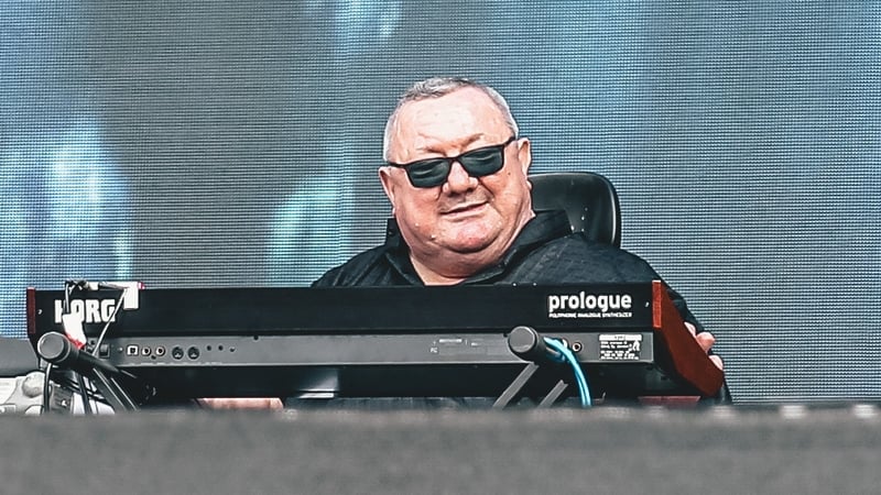 Dave Ball on stage in 2023